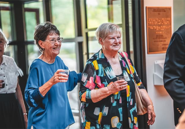 Women smiling with drinks