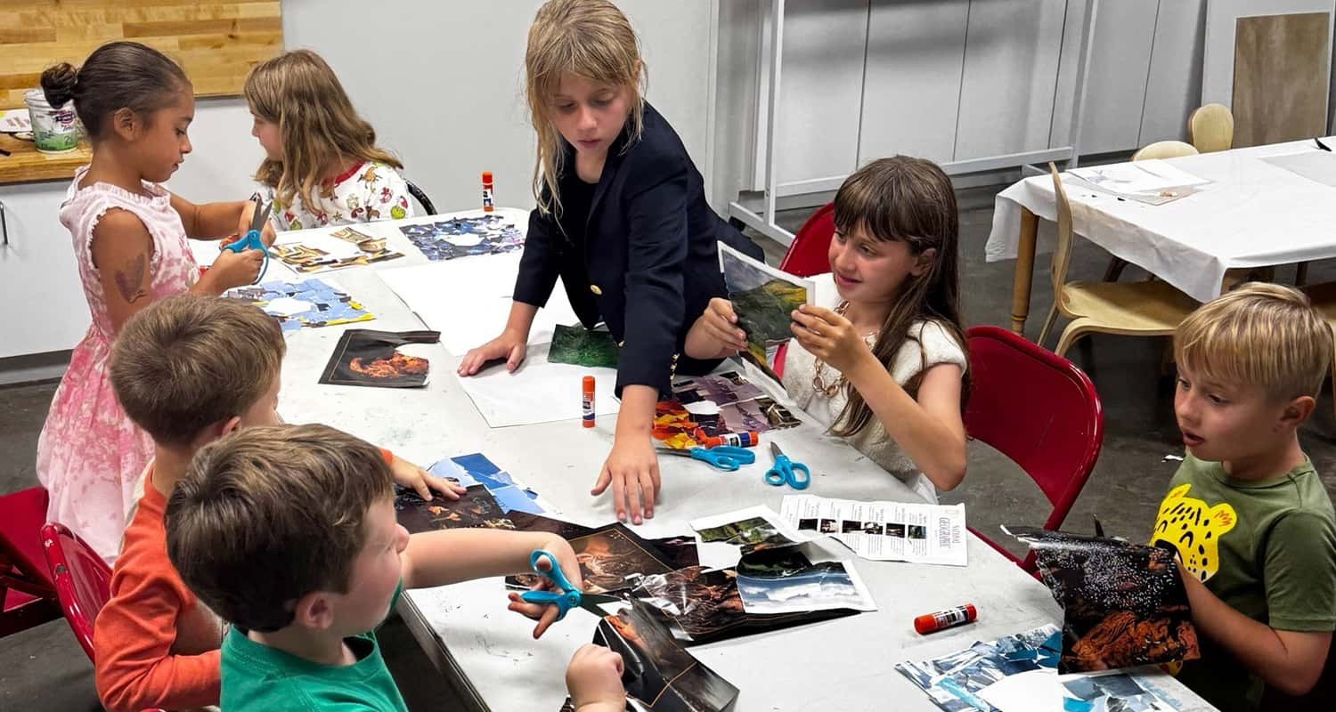 Children making craft in art workshop
